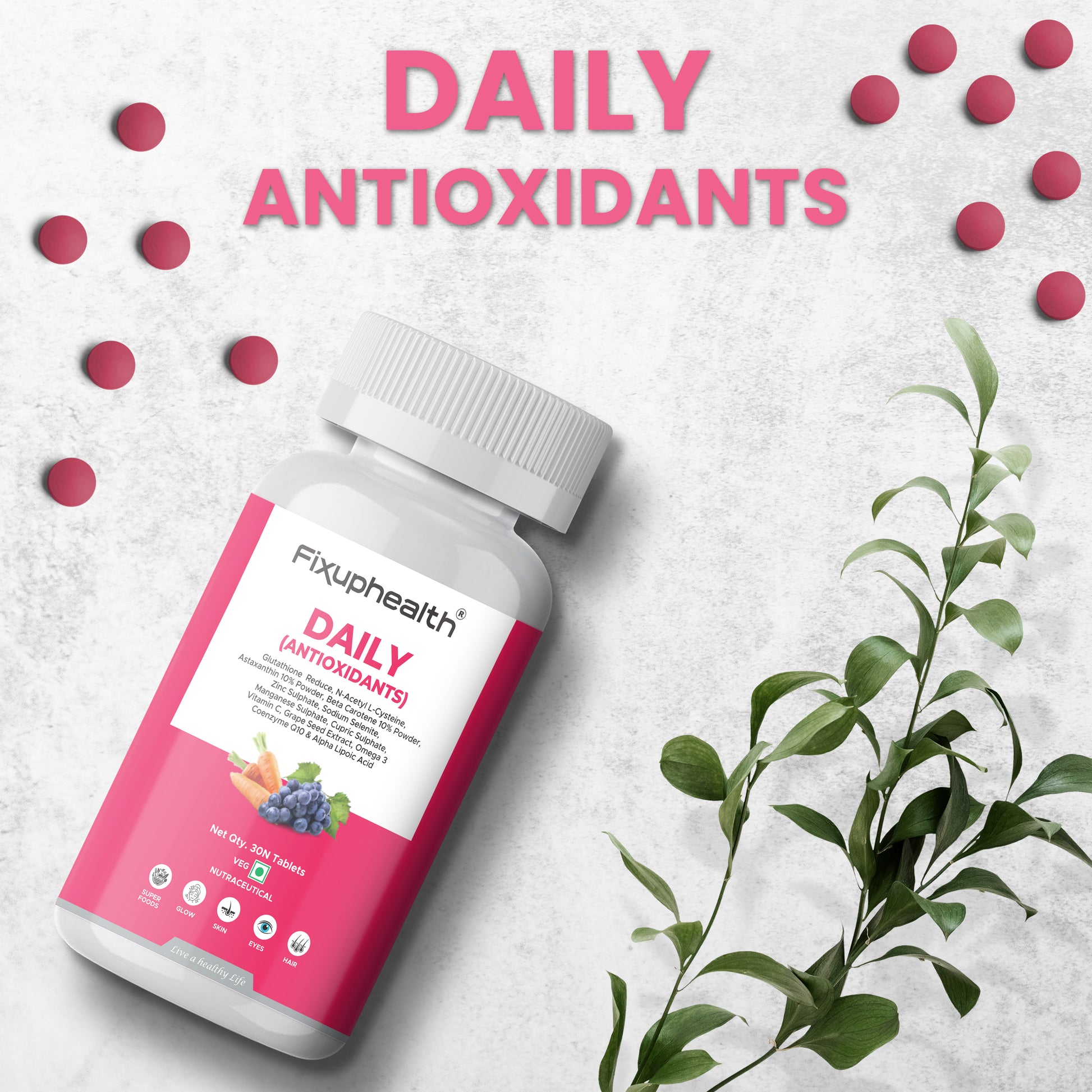 Fixuphealth daily antioxidants supplement bottle with pink capsules and green leaves on a light background