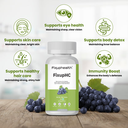 Fixuphealth FixupHC supplement bottle with health benefits listed on a wooden surface with grapes.